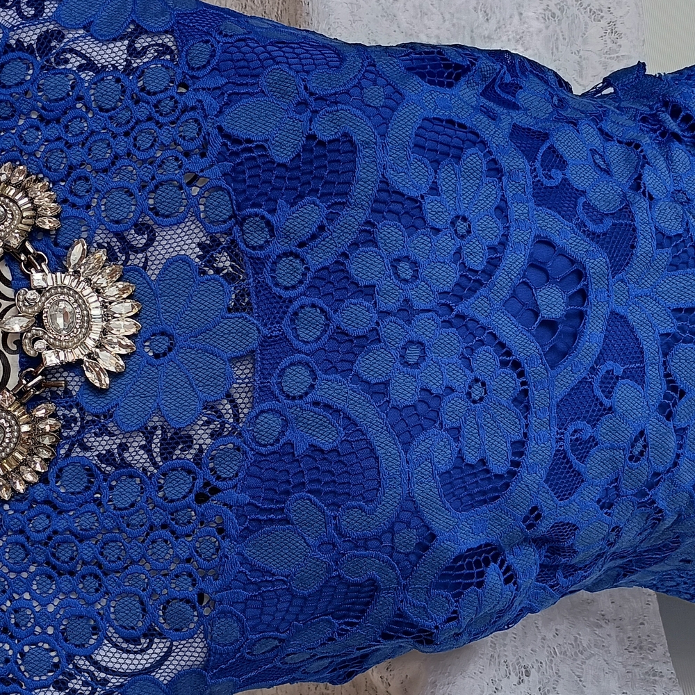 Elegant Blue Lace Dress with Brooch